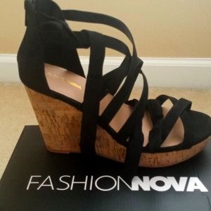 Fashion Nova size 11W black velvet material wedge sandals. New still in box.